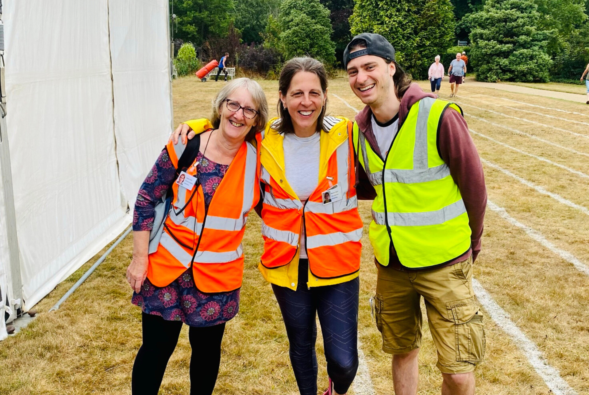 Volunteers smiling at Revive Christian Holiday